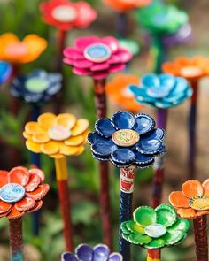 colorful flowers made out of plastic bottle caps