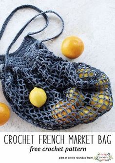 a crochet french market bag with lemons and an orange on the side