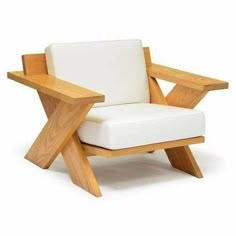 a white chair sitting on top of a wooden frame