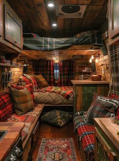 the inside of a small camper with lots of furniture and decor on it's walls