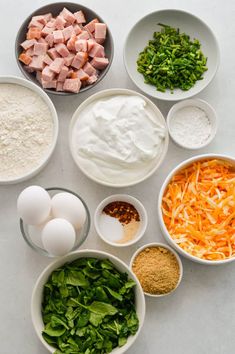 the ingredients are laid out in bowls to make this meal, including eggs, cheese and ham