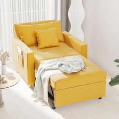 a living room with a yellow couch and white curtains