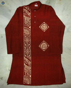 a red shirt with white designs on it