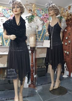 "Beautiful 1920's Great Gatsby style flapper dress, black sheer embellished with shinny grey glass beads and sequins. The dress has a spaghetti straps dropped waist, hanky hem fully lined with black stretch fabric. Cut on the bias, flares amazing towards the hem. In very good condition, this dress is absolutely gorgeous, pure 20's glamour, giving a real period feel. Please, check the measurements below: Length armpit to hem: 33-42\"/84-107 cm Bust: 32\"/ 82 cm Waist: 34\"/ 87 cm Hips: 60\"/ 152 cm Note: Any display/ accessory items are not included in this transaction" 1920s Womens Dress, Black Art Deco Flapper Dress For Night Out, 1920s Beaded Fitted Dress, 1920s Fitted Beaded Dress, 1920s Embellished Black Dress, 1920s Black Embellished Dress, 1920s Fitted Black Flapper Dress, 1920s Black Summer Dress, Black Gatsby Style Dress For Vintage Events