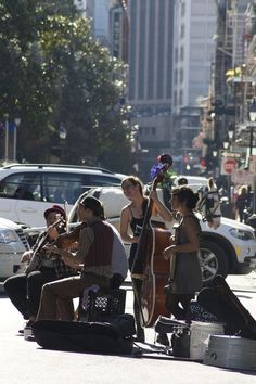 some people are playing music on the street