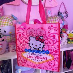 Hello Kitty Vegas Tote Bag Brand New Medium Sized Tote Bag Cute Pink Tote Bag, Can Be Used As A Regular Go To Bag Or Grocery Bag. From Vegas. This Is Perfect For All Sanrio Lovers! P.S. If You Want A Bundle Of Items, You Will Get A Discount. All Purchased Over $50 Will Receive A Freebie (Shipping Not Included). Cute Hello Kitty Print Tote Bag, Playful Hello Kitty Bag For Gift, Playful Hello Kitty Bag As A Gift, Playful Hello Kitty Bag As Gift, Cute Hello Kitty Bags For Daily Use, Playful Hello Kitty Rectangular Bag, Playful Rectangular Hello Kitty Bag, Cute Hello Kitty Shoulder Bag For Gift, Cute Hello Kitty Shoulder Bag As Gift