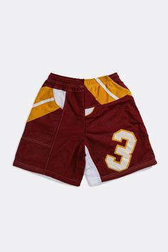 Unisex basketball shorts upcycled from a Starbury jersey and deadstock mesh. Featuring pockets and an elasticized waistband with drawstrings. Sourced and reworked in Canada Product DetailsSize: Women's S, Men's XS*Men size upCondition: Good vintage conditionMaterial Composition: 100% polyesterColour: Burgundy, mustard Basketball Shorts, Jersey Shorts, Mustard, Basketball, Composition, Mesh, Womens Shorts