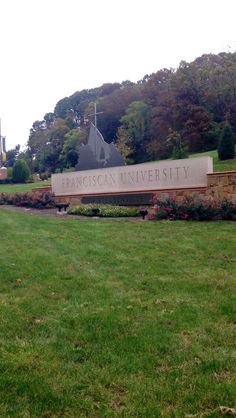 a large sign that is in the grass