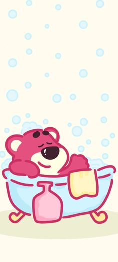 a teddy bear taking a bath in a tub