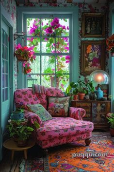 a living room filled with lots of furniture and flowers on the window sill,