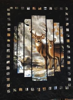 two deer standing next to each other in front of a painting on a black quilt