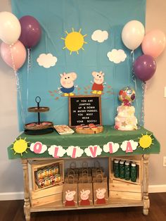 peppa pig themed birthday party with cake and balloons