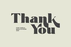 the words thank you are written in black on a light gray background, with an image of