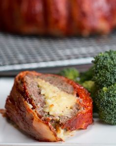 meatloaf and broccoli on a white plate