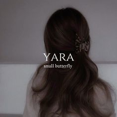 the back of a woman's head with text that reads yara small butterfly