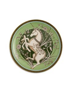 a green plate with an image of a unicorn on it