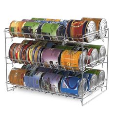 three tier spice rack with multiple cans on it