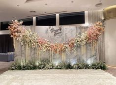 a large floral display in the middle of a room