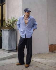 a man standing in front of a building