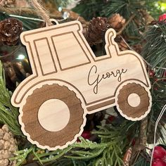 a wooden ornament hanging from a christmas tree