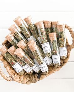 a basket filled with lots of different types of herbs