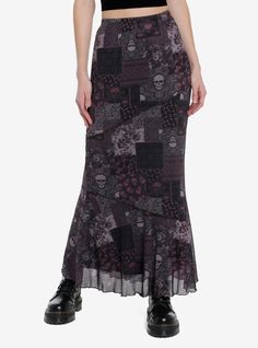 Keep your look artsy with a splash of darkness in this maxi skirt! It features asymmetrical ruffle lining throughout and an allover paisley skull patchwork print on mesh. Stretchy waistband.95% polyester; 5% spandexWash cold; dry lowLength: 40"Stretchy materialImportedListed in junior sizesModel is 5'10"Model wears size Small Fishtail Maxi Skirt, Patchwork Midi Skirt, Alternative Maxi Skirt Outfit, Earthy Skirts, Whimsigoth Skirt, Skull Patchwork, Whimsigoth Fashion, Social Collision, Patchwork Maxi Skirt