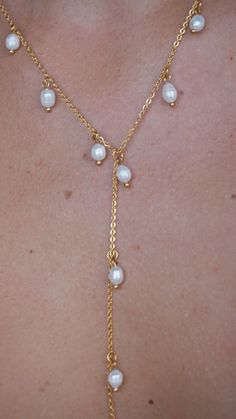 Nothing is quite as graceful as a pearl necklace. Pearl jewelry exudes class and elegance. This lariat style drop pearl necklace makes the perfect centerpiece of all your favorite outfits. Dainty chains along with dainty freshwater pearls. 18k Gold Plated Stainless Steel Chain Imitation pearl Quality: Waterproof, Hypoallergenic, Tarnish Free 100% Eco-Friendly; No Nickel, Chromium and Lead Pearl Lariat Drop Necklace With Pearl Drop, Delicate Lariat Drop Necklace With Pearl, Delicate Pearl Drop Lariat Necklace, Long Drop Pearl Chain Necklace, Elegant Pearl Lariat Backdrop Necklace, Pearl Pendant Lariat Backdrop Necklace, Elegant Pearl Dangle Lariat Necklace, Elegant Pearl Lariat Necklace With Dangle, Elegant Pearl Lariat Dangle Necklace