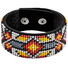 a black bracelet with multi colored beads and silver metal studs on the end of it