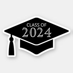 a graduation cap with the words class of 202 in white and black, on a gray background