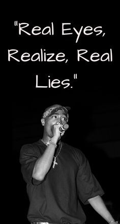 a man talking on a cell phone while standing in front of a black background with the words real eyes, realize, real lies