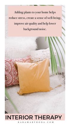 a pillow with the words interior therapy on it and an image of a palm tree in the background