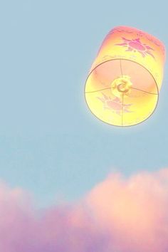 a yellow and pink lamp in the sky