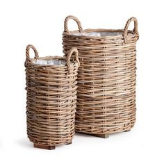 two wicker baskets sitting next to each other