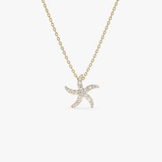 14k Solid Gold Diamond Starfish Charm Pendant / Gold Necklace / Diamond Starfish Necklace / Layering Necklace / Diamond Pendant ▶ Details   * Made to Order * Gold KT: 14K Solid Gold (also available in 18K & Platinum upon request) * Round Diamond: 10 pcs 1.0 MM * Round Diamond: 5 pcs 1.3 MM * Round Diamond: 5 pcs 1.5 MM * Round Diamond: 1 pcs 1.9 MM * Total CTW: 0.25 ctw * Diamond Color-Clarity: G Color SI Clarity * Ready to Ship in 3-10 Business Days ▶ See more of our Diamond Necklaces here - https://etsy.me/3YbpVq2  ▶ See our storefront here - http://etsy.me/2lUcVnH  ▶ All store sections here * Diamond Rings - http://etsy.me/2lwKUl8  * Diamond Earrings - http://etsy.me/2lyqVBP  * Diamond Necklace - http://etsy.me/2mqa6O1  * Diamond Bracelets - http://etsy.me/2mVrAB5  * Diamond Wedding Rin Necklace Diamond Pendant, Gold Necklace Diamond, Diamond Color Grade, Starfish Necklace, Gold Armband, Necklace Layering, Necklace Diamond, Halo Earrings Studs, Ruby Jewelry