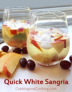 two glasses filled with white sangria next to sliced apples