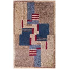 a rug with squares and stripes on it