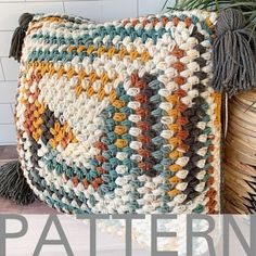 a crocheted pillow with text that reads, spill the beans pillow free crochet pattern