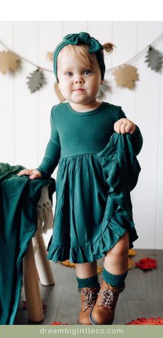 Toddler girl wearing a green Christmas dress with a matching hair bow. Evergreen Color, Tuxedo Accessories, Toddler Flower Girls, Girls Dress Outfits, Toddler Flower Girl Dresses, Infant Flower Girl Dress, Tea Party Dress, Christening Outfit