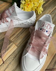 Embroidered Converse with Pearls and rhinestones on the toes, heels and scattered across the sides. Finished off with ribbon laces! I will use white ribbon laces unless you request a different color, Message me your requests as all colors are not always available (some other colors are available) Getting Married? What a great idea. This listing is for Mrs on the tongue and with date on the side ! I will use the font shown unless you message me with your requests! You choose your thread colors, I Low-top Wedding Shoes With White Laces For Bridal Shower, Converse With Pearls, Bride Shoes Wedding, Sneakers Wedding, Lilac Shoes, Converse Wedding, Embroidered Sneakers, Bling Converse, Embroidered Converse