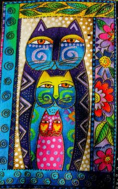 two cats are sitting next to each other on a colorful cloth with flowers and leaves