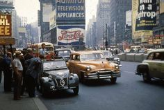 an old photo of cars and people on the street in new york city, ny