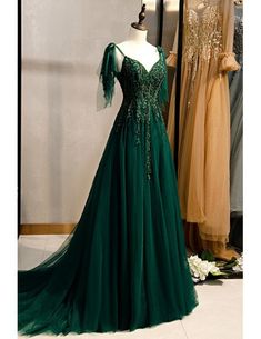 Green Homecoming Gown With Sweep Train, Green Gown With Sweep Train For Homecoming, Green Homecoming Evening Dress With Sweep Train, Green Evening Dress With Sweep Train For Homecoming, Formal Green Tulle Evening Dress, Green Tulle Evening Dress For Formal Occasions, Green Floor-length Evening Dress For Homecoming, Green Tulle Dress With Sweep Train, Dark Green Floor-length Prom Gown