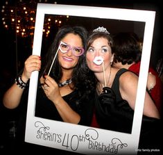 two women pose for a photo in front of a birthday sign with the words, sherriys 10th birthday on it