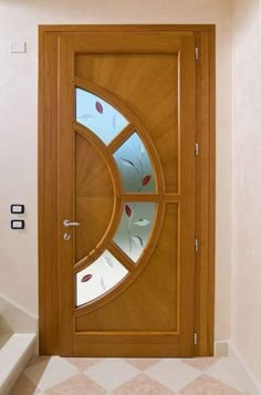 a wooden door with a circular glass window in the center and side panels on both sides