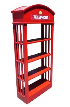 a red phone booth with shelves on the front and bottom shelf, for phones or other electronic devices