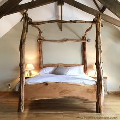 a large bed sitting in the middle of a bedroom