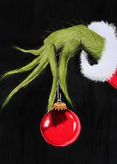 an acrylic painting of the grin face hanging from a christmas ornament