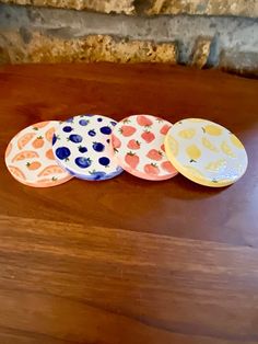 three plates sitting on top of a wooden table