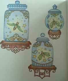 an open book with drawings of jars and dragonflys on it's sides