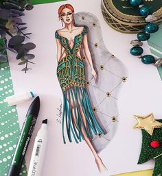 a drawing of a woman in a green dress on top of a table with christmas decorations